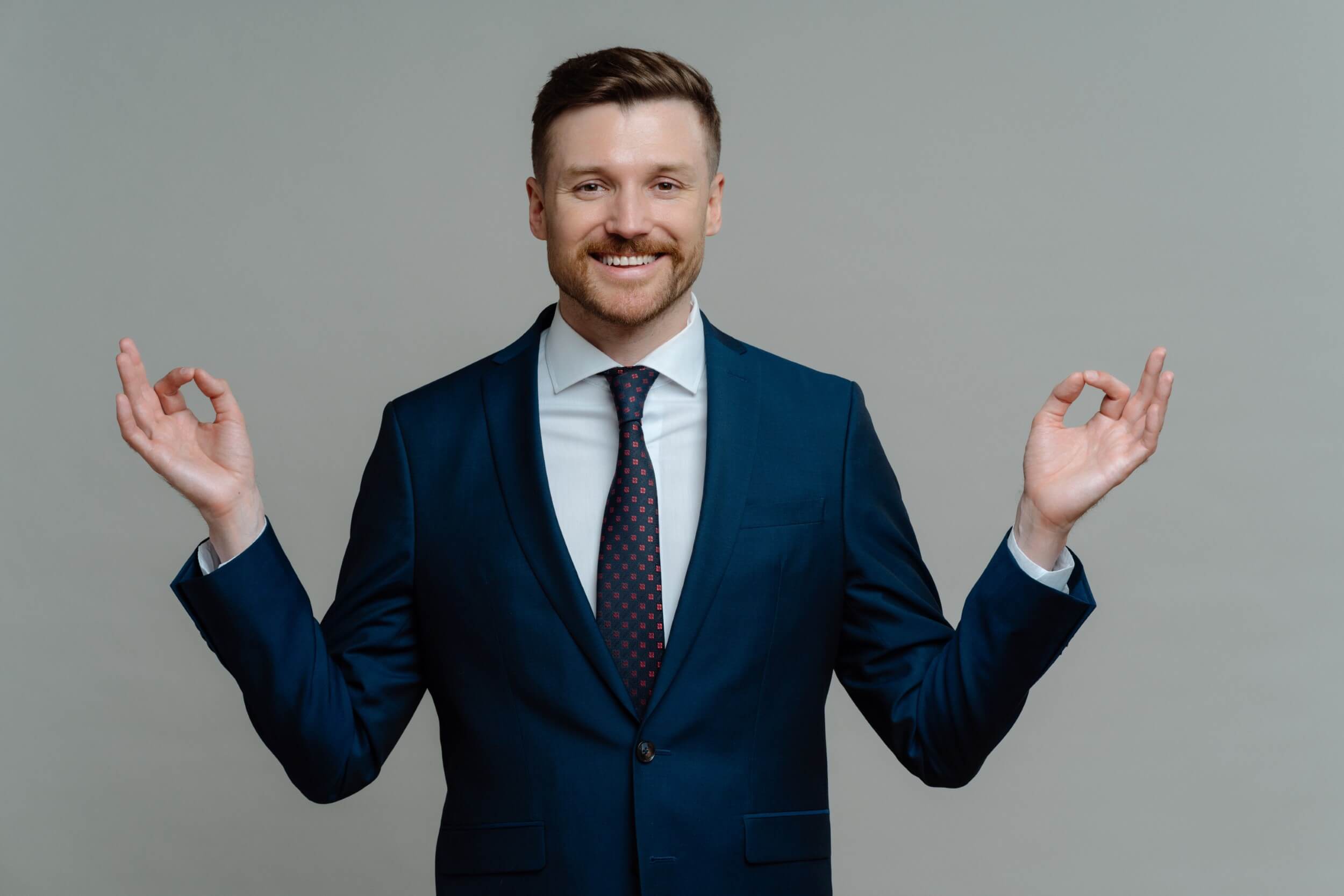 happy-businessman-in-suit-meditating-and-feeling-p-2021-09-03-04-11-52-utc.jpg